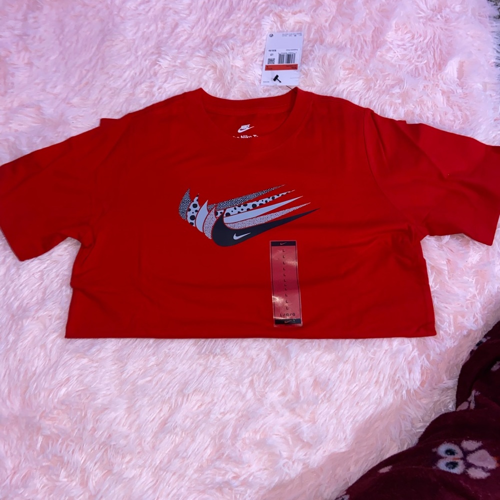 A brand new red nike shirt